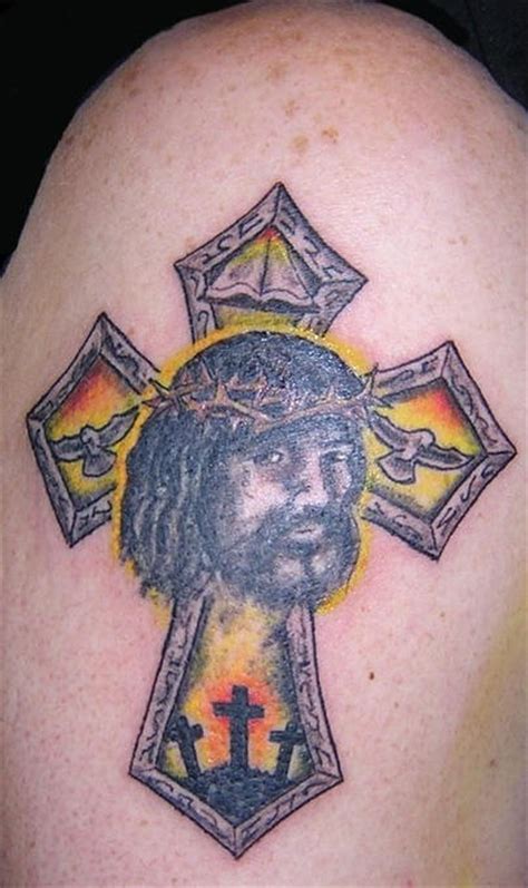 Shoulder tattoo,serious christ on the cross - Tattooimages.biz