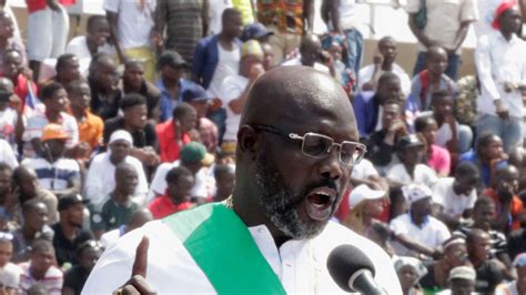 George Weah: Ex-footballer sworn in as Liberian president with vow to create jobs | World News ...