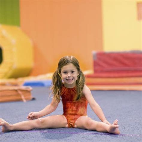 Young girl stretching during a gymnastics class. Gymnastics Games, Gymnastics Warm Ups ...