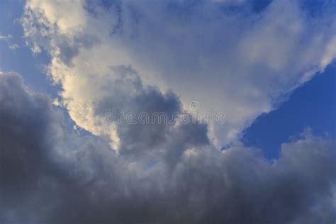 Storm clouds at sunset stock photo. Image of cloudscape - 152621028