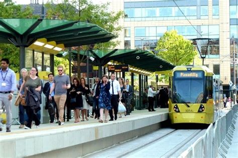 New look St Peter's Square tram stop now open and has just welcomed its first commuters