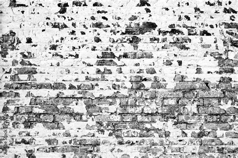 Texture of a brick wall with cracks and scratches Stock Photo | Adobe Stock