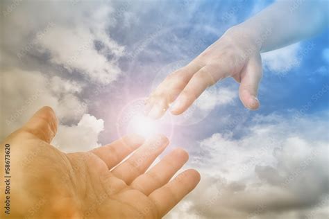 God's Saving Hand reaching for the faithful Stock Photo | Adobe Stock