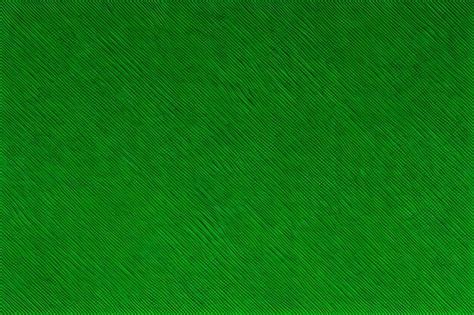 Premium Photo | A green background with a pattern of lines.