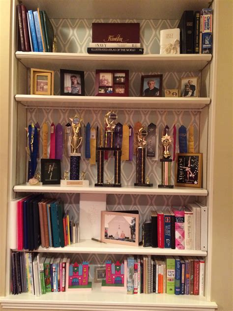 Bookshelf organization, dance trophy display, ribbon display using tension rod Trophy Display ...