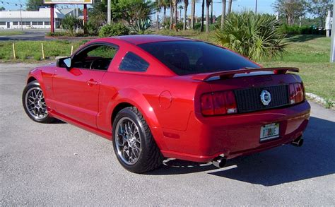 Dark candy apple red 2008 ford mustang shelby gt500