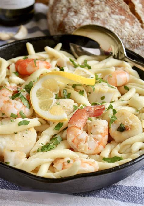 seafood pasta in a cast iron pan | Seafood pasta, Seafood pasta dishes, Seafood pasta recipes