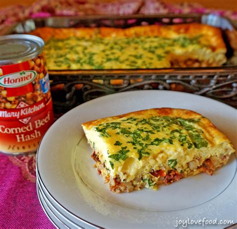 Corned Beef Hash and Egg Casserole with Sun-Dried Tomatoes and Swiss Cheese - Joy Love Food