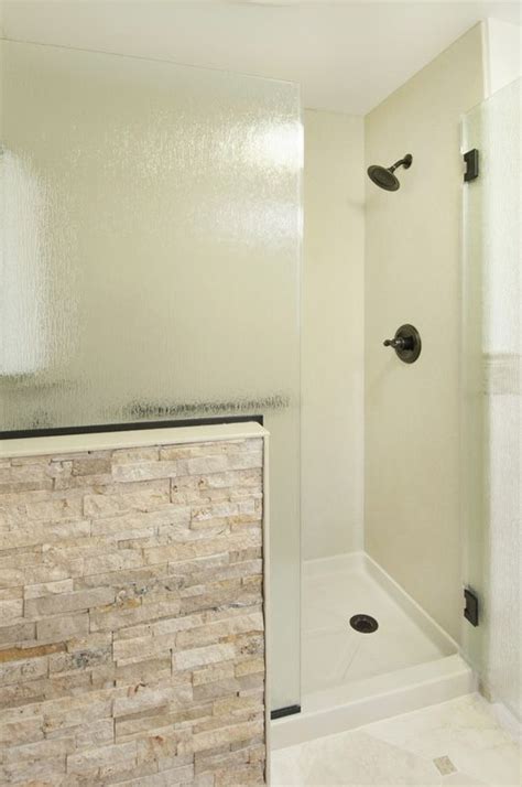 Bath Remodel Solid Surface Shower with Stone Accent Wall ... | Bathrooms remodel, Master bath ...