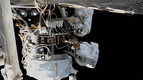 ISS Astronauts Took A Spacewalk To Install New Docking Port For Commercial Spaceships - Great ...