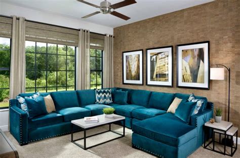 Traditional living room decor with teal sofa