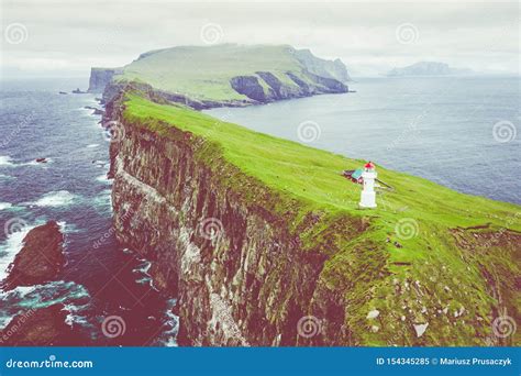 Aerial View of Lighthouse at Mykines Island in Faroe Islands, North Atlantic Ocean. Photo Made ...