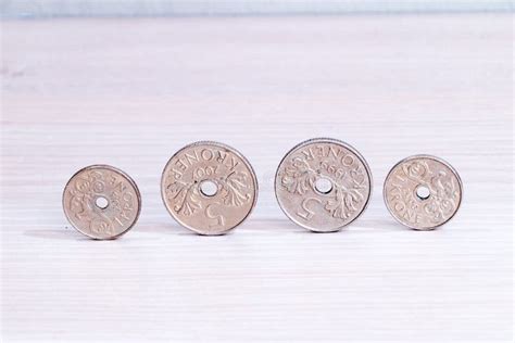 Norwegian Krone NOK Coins with Hole on Wooden Table Stock Image - Image of modern, bank: 239004057