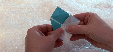 How to An origami paper snowflake « Origami :: WonderHowTo