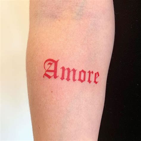 Amore gothic | Tattoo designs, Tattoo lettering, Red tattoos