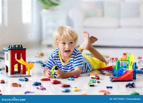 Kids Play with Toy Cars. Children Playing Car Toys Stock Image - Image of drive, family: 145779563