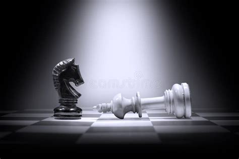 White King Chess Piece Defeating by Black Knight Chess Piece Stock Photo - Image of intelligence ...