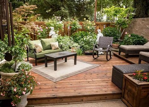 Lining a deck or patio with lush container garden creates a sense of privacy Small Backyard ...