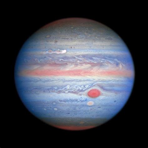 Dazzling new images of Jupiter show "remarkable new storm" moving at 350 mph - CBS News