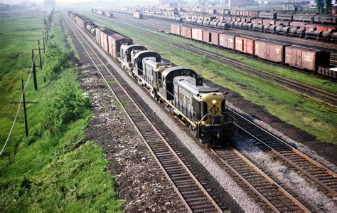 transpress nz: Erie Lackawanna railroad Alco RS3 trio on a freight train, early 1960s