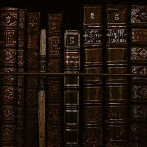 an old book shelf filled with lots of books