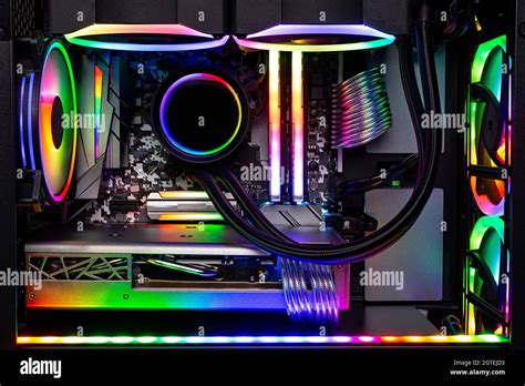 Inside view of black high end custom colorful illuminated bright rainbow RGB LED gaming pc ...