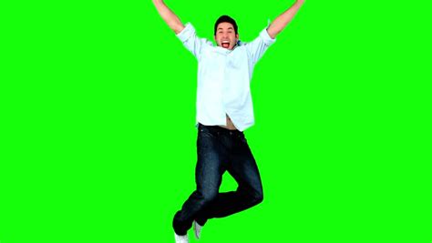 Young Man Jumping On Green Screen In Slow Motion Stock Footage Video 4049944 - Shutterstock