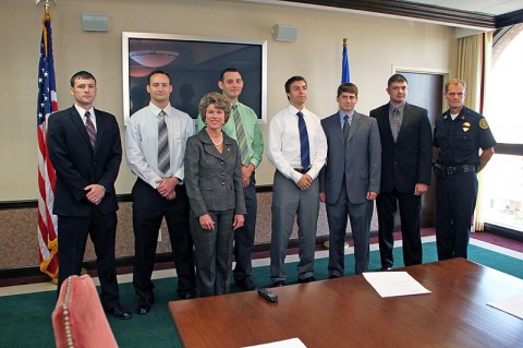 Left to Right:  Dustin Reynolds, Greg VanMeter, Mayor Kim McMillan, Lance Alsup, Anthony Murphy, Thomas Biele, Gary Mefford, Chief Al Ansley. (Photo by CPD-Jim Knoll)