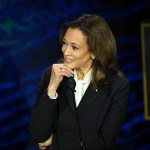 Kamala Harris listens as former President Trump speaks during a presidential debate at the National Constitution Center in Philadelphia, Pennsylvania.