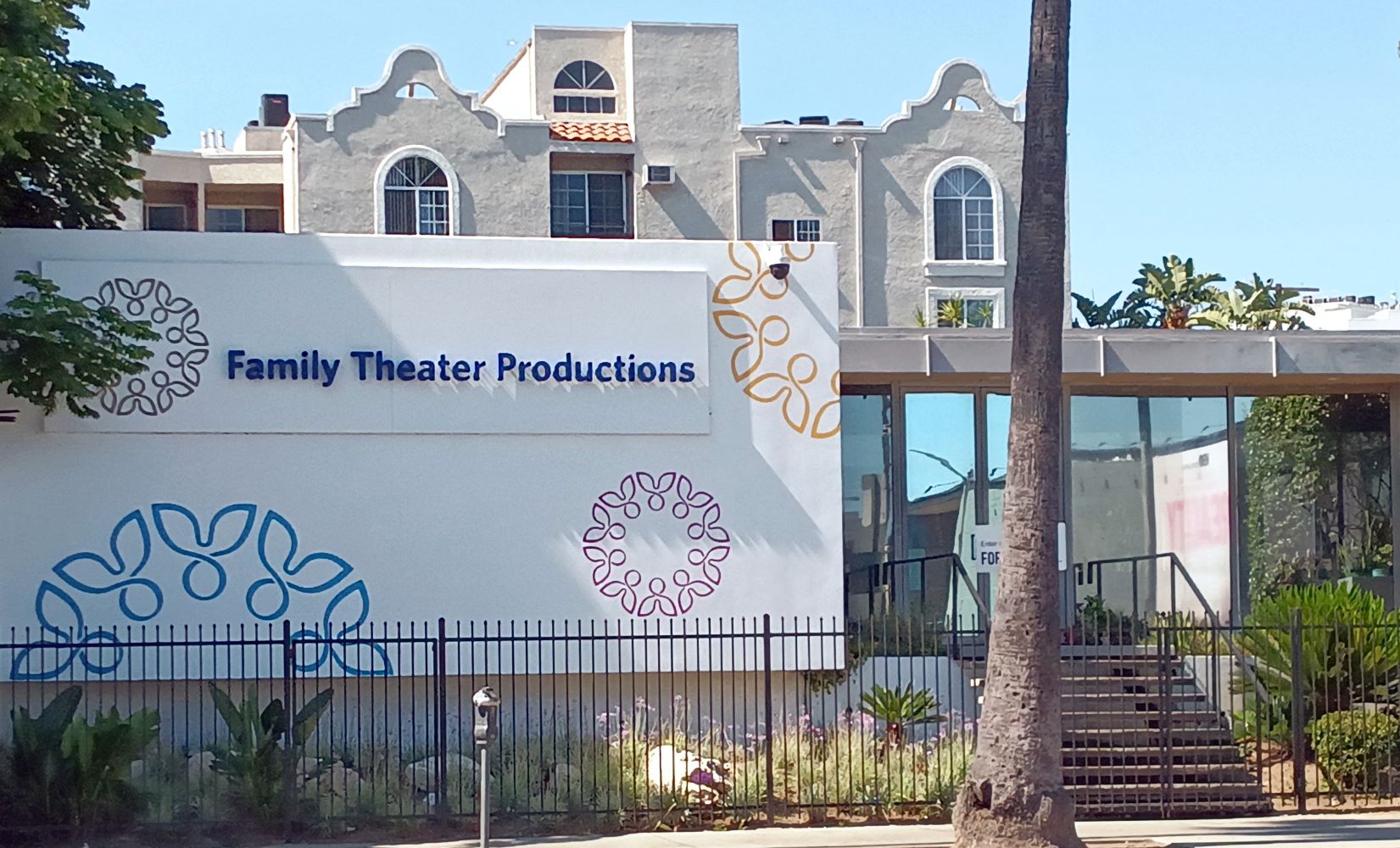 exterior of the family theater production building on sunset boulevard