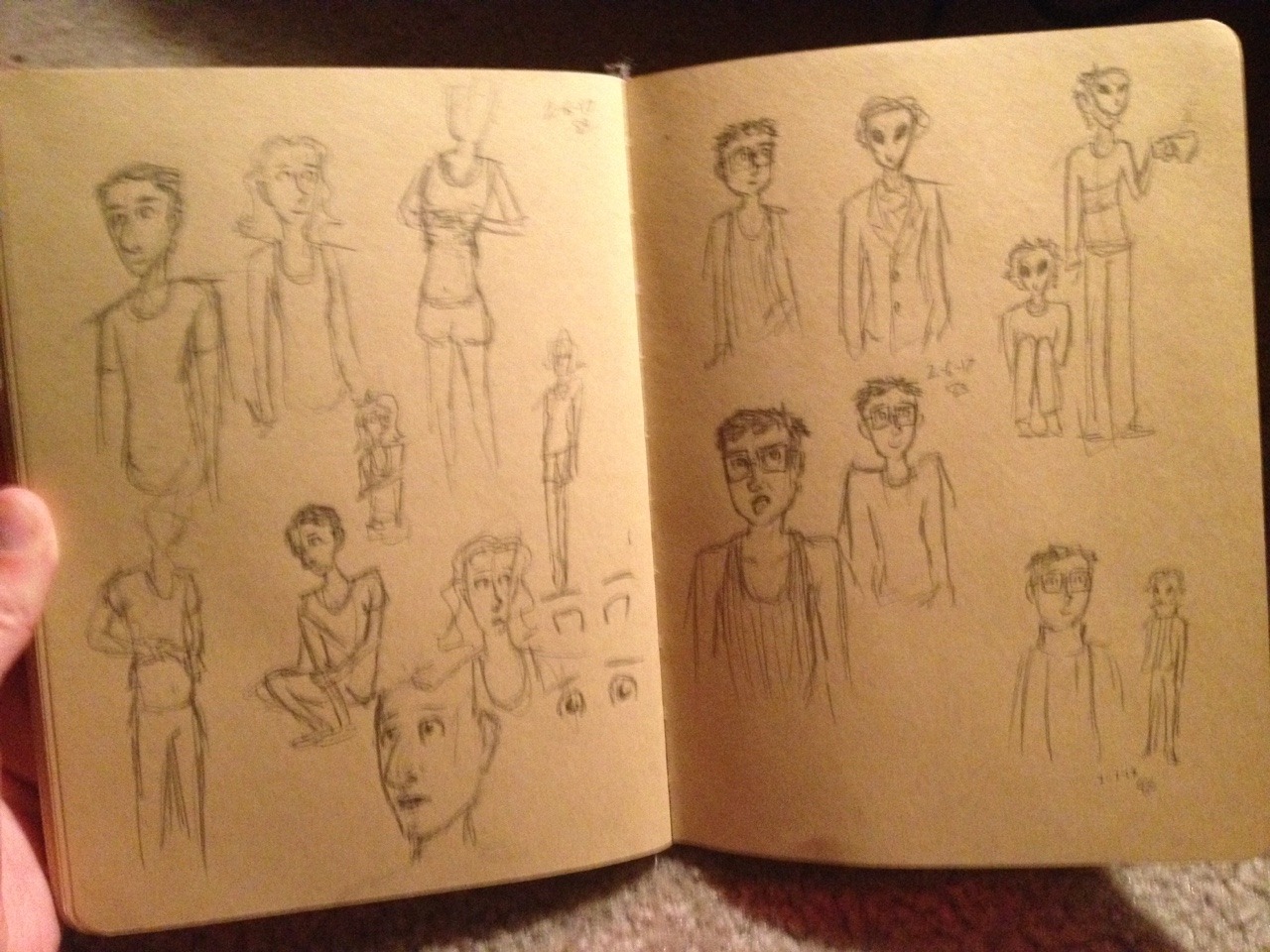 Some sketches I’ve done of my art children, slightly blurry and by the light of a snake’s lamp.