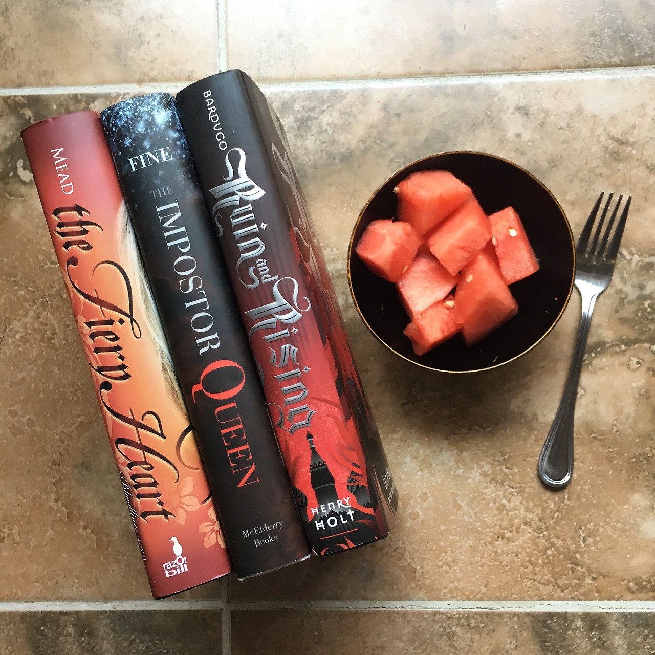 bookaddict24-7:
“ Day 16 of August Maiden Book Photo Challenge: Book Spine Beauty
I love this theme of red and watermelon is so stinking refreshing during the summer!
(Instagram)
”