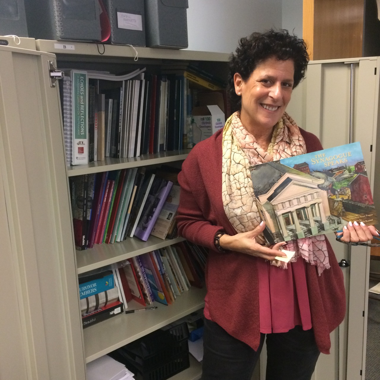 jewishmuseummd:
“  #DYK: Today is #LibraryShelfieDay? (The 4th Wednesday in January!)
Here’s a peek at our education library shelves, with our Director of Learning and Visitor Experience Ilene to show off our braille copy of The Synagogue...