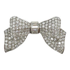 Estate Cartier Diamond and Platinum Bow Pin, Circa 1940's-1950's.