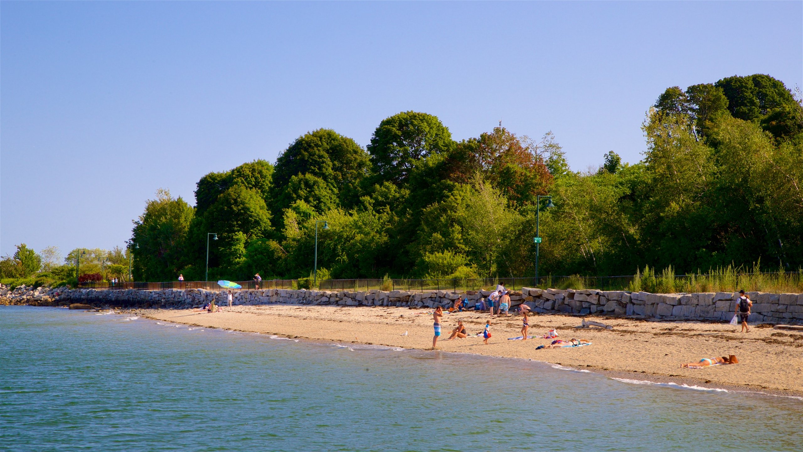 East End Beach featuring general coastal views and a beach as well as a small group of people