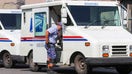 MECHANICSVILLE, DANVILLE, PENNSYLVANIA, UNITED STATES - 2022/07/20: A United States Postal Service (USPS) worker exits a Grumman Long Life Vehicle. On July 20, the USPS announced that at least 40 percent of its Next Generation Delivery Vehicles (NGDVs) and commercial off-the-street (COTS) vehicles will be battery electric vehicles. (Photo by Paul Weaver/SOPA Images/LightRocket via Getty Images)
