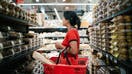 Woman shopping for groceries in Brooklyn, NY, on September 15, 2023. By 2030, women are set to control an estimated $30 trillion as baby boomer women inherit wealth from spouses who pass earlier, and as Gen Z women demand equal pay and fair compensation.