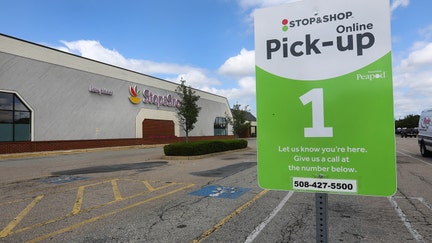 BROCKTON - AUGUST 17: Parking spaces are designated for online pick-up orders at Stop and Shop in Brockton, MA on Aug. 17, 2020. The Stop&amp;Shop, at 683 Belmont Street, in Brockton, closed earlier this year because of slow sales.  It has reopened as a center for grocery pickup and delivery, during the coronavirus pandemic. (Photo by Pat Greenhouse/The Boston Globe via Getty Images)