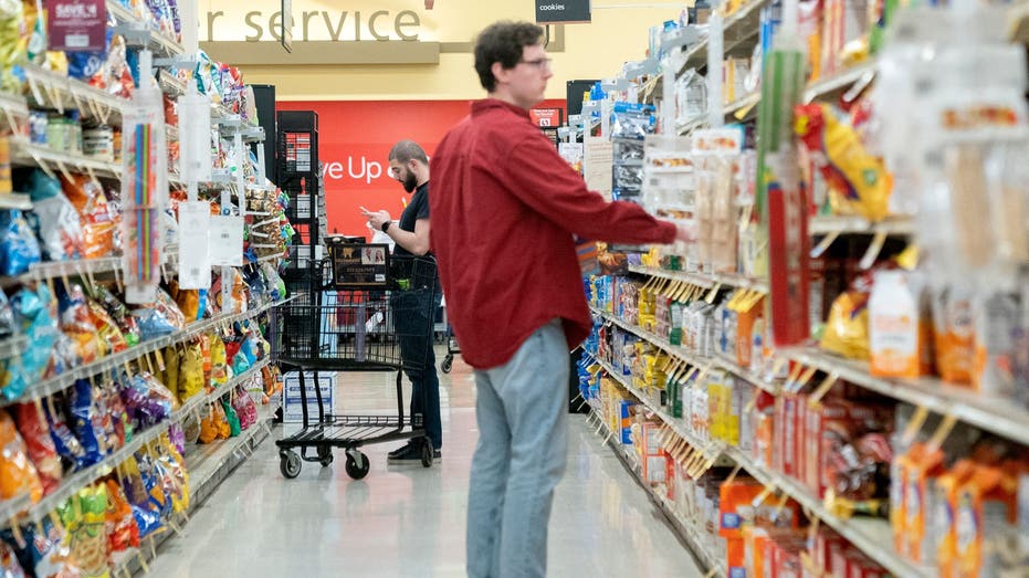 Young adult grocery shopping