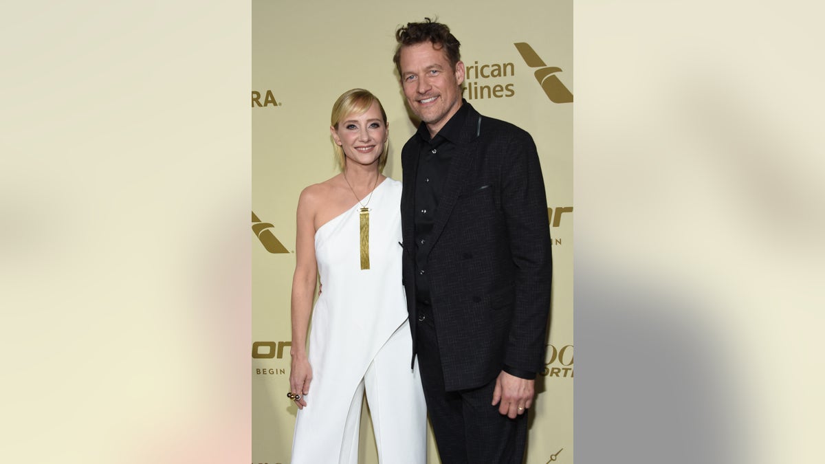 Anne Heche and James Tupper on red carpet