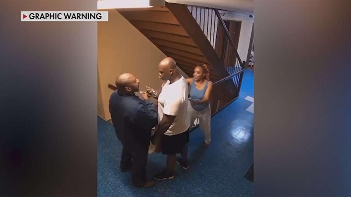 A man points a scissors at his neighbor moments before being shot during a dispute in Brooklyn