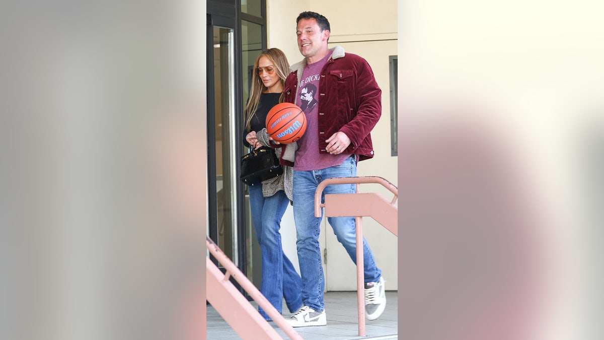 Ben Affleck and Jennifer Lopez leave basketball game in LA.