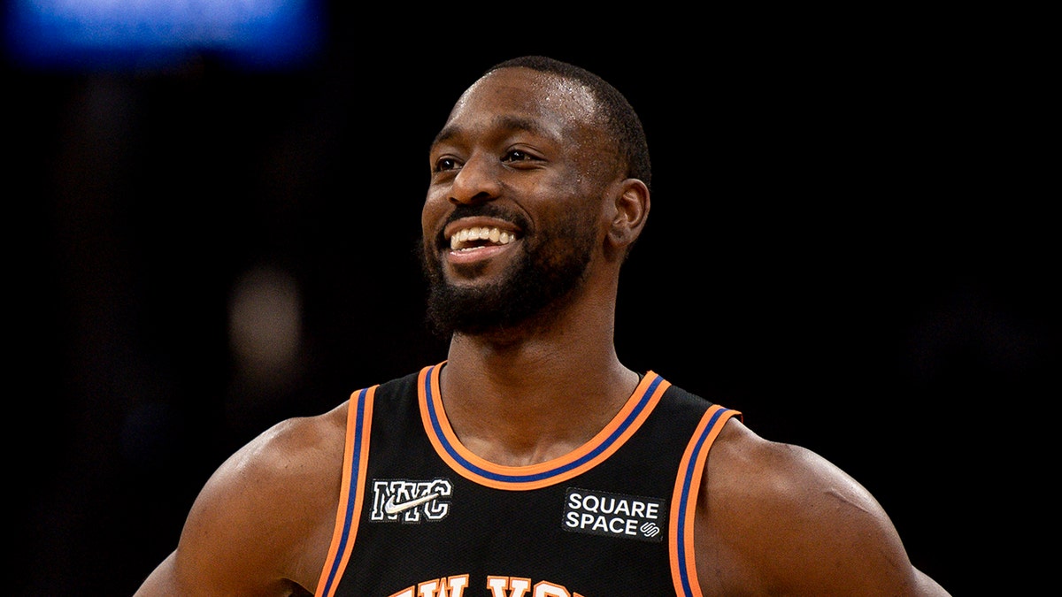 Kemba Walker smiles on court