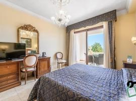 HOTIDAY Room Collection - Olbia Porto，位于奥尔比亚奥尔比亚机场 - OLB附近的酒店