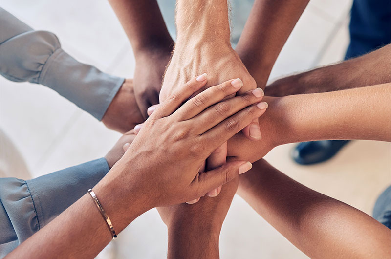 Diverse team in a huddle