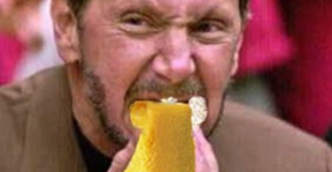 Larry Ellison eats a hot dog