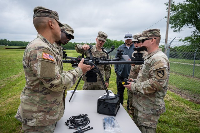 Soldiers assess an unmanned aircraft system with software programmed to find subsurface explosives in real time May 15 at Training Area 224, during the 2024 Maneuver Support and Protection Integration eXperiments event, commonly referred to as...