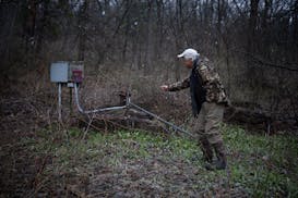 Paul Wotzka  looked over a water well at his home in Altura, Minn., in April. Lawmakers directed $16 million to the problem of farm runoff pollution o