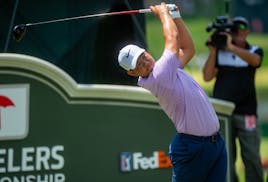 Tom Kim hits from the 18th tee during the second round of the Travelers Championship at the TPC River Highlands in Cromwell, Connecticut, on Friday.