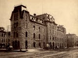 A brick building photographed in the 1880s shows where the Tribune was once located.